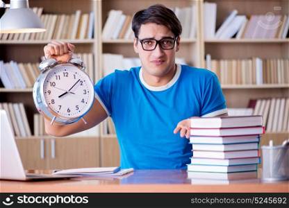 Young student preparing late for his exams
