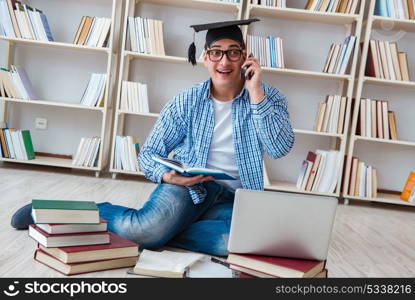 Young student studying with books