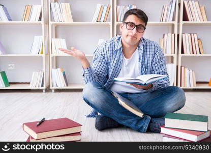 Young student studying with books