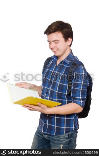 Young student with book on white