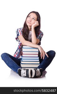 Young student with books isolated on the white