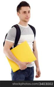 Young student with his notebook in hand, smiling and looking at somebody