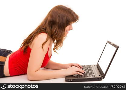 Young student working with her laptop, isolated over a white background