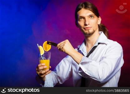 Young stylish man bartender preparing serving alcohol cocktail drink