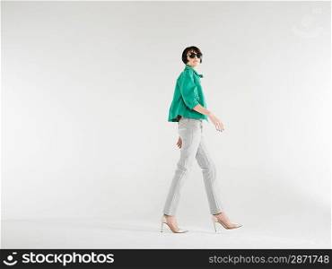 Young Stylish Woman Walking