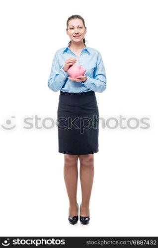 young successful businesswoman with a pink piggy bank on a white background