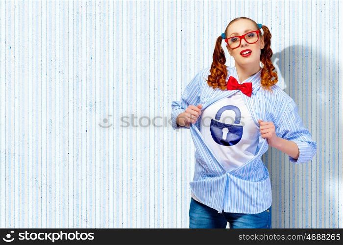 Young super hero woman. Young woman acting like super hero with lock sign on chest