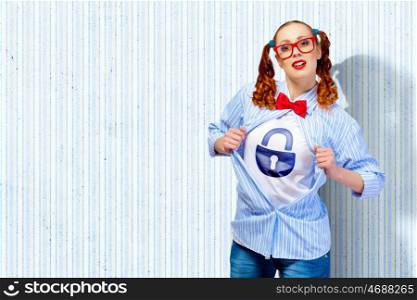 Young super hero woman. Young woman acting like super hero with lock sign on chest