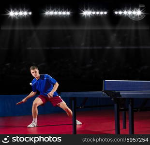 Young table tennis player at sport hall