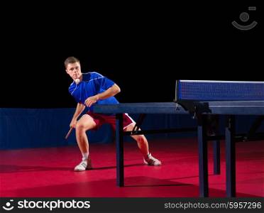 Young table tennis player isolated