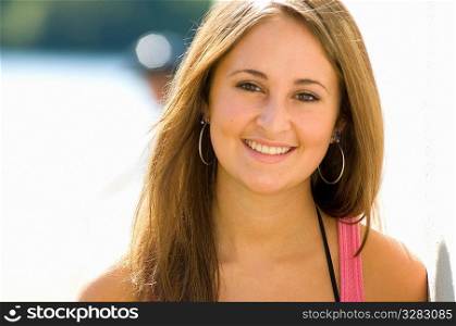 Young teen aged girl smiling.