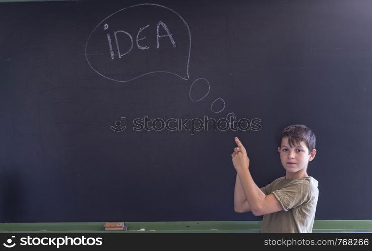 "Young teen and blackboard with "idea", Education concept"