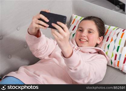 young teen girl making a selfie