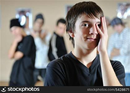 young teen hidding face with hand