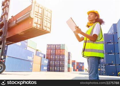 young teen women happy staff worker enjoy working container loading in logistic port industry