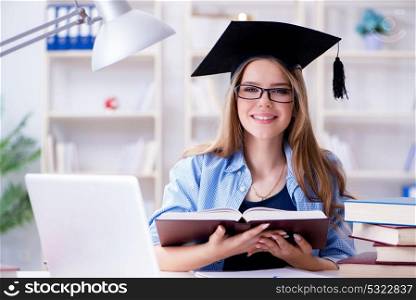 Young teenage female student preparing for exams at home