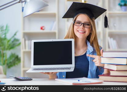 Young teenage female student preparing for exams at home