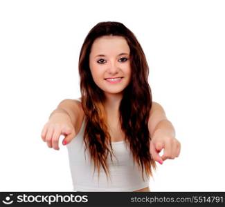 Young teenage girl pointing at camera with his index finger isolated on white background