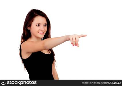 Young teenage girl pointing at something with his index finger