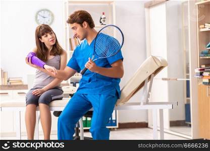 Young tennis player visiting doctor traumatologist 