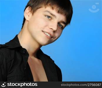 Young the man.It is isolated on a blue background