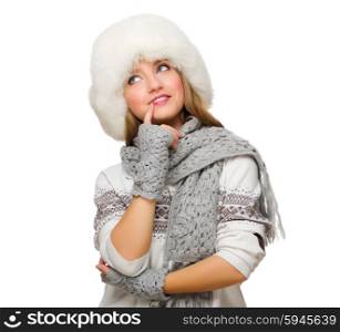 Young thinking girl with fur hat isolated