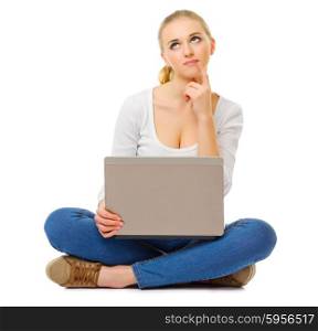 Young thinking woman with laptop isolated