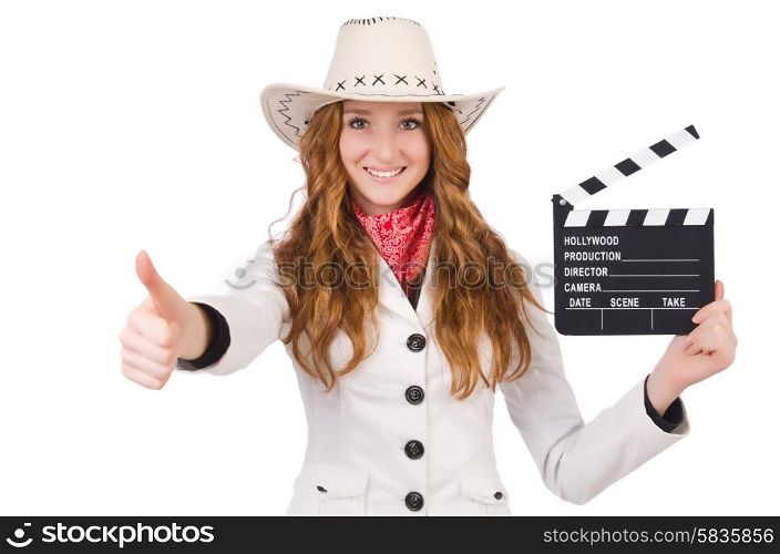 Young thumbing cowgirl with movie board isolated on white