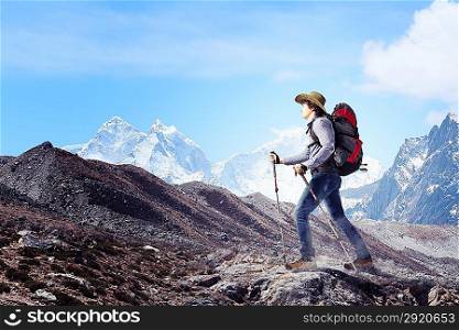 Young tourist atop of mountain