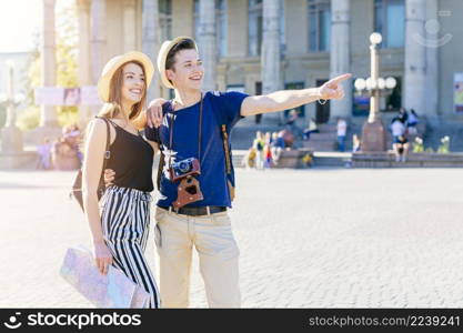 young tourist couple visiting city