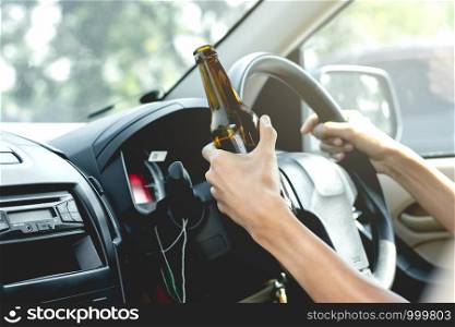 Young tourists are driving while drinking alcohol.