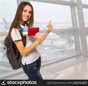 Young travelling girl in airport