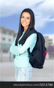 Young University Student with a Bagpack in the College