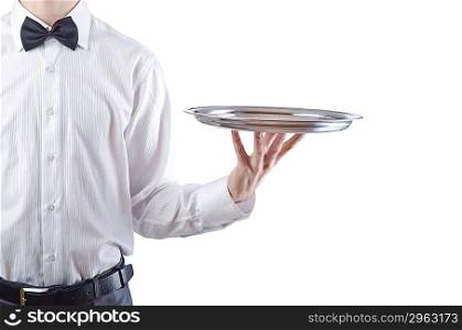 Young waiter with silver tray
