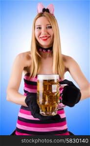 Young waitress with beer on white