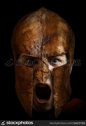 Young warrior shouting with a spartan helmet