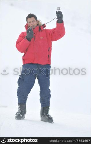 young weather meteo man measure wind speed at winter season