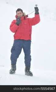 young weather meteo man measure wind speed at winter season