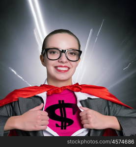 Young woman acting like super hero with dollar sign on chest. She is super financier