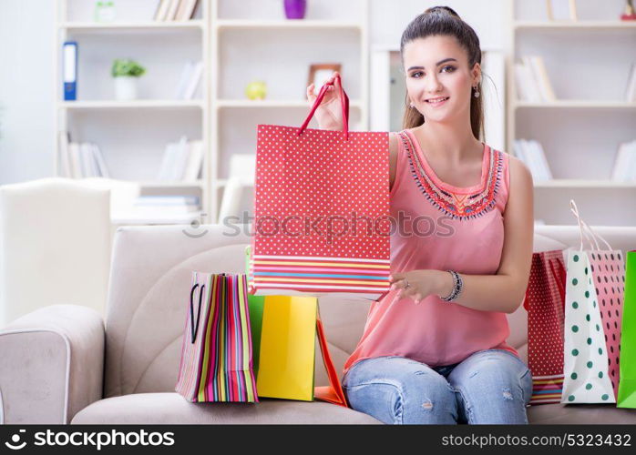 Young woman after shopping with bags