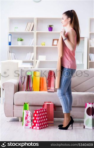 Young woman after shopping with bags
