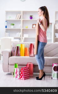 Young woman after shopping with bags