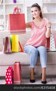 Young woman after shopping with bags