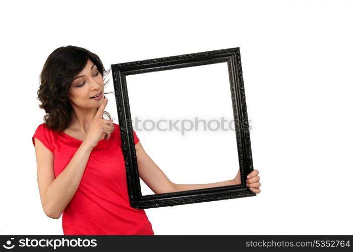 young woman and a wooden frame