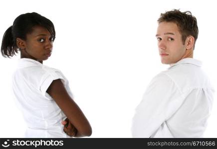 Young woman and a young man standing with their arms crossed