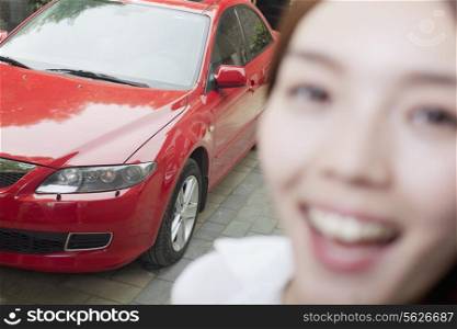 Young Woman and Her Car