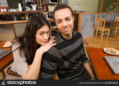 Young Woman and Man in Casual Embrace