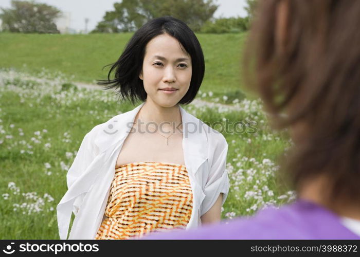 Young woman and man on a field