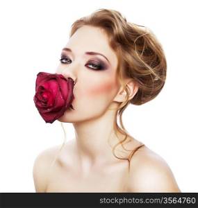 young woman and rose in mouth on white background