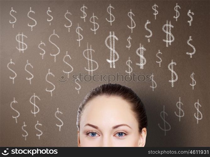 Young woman and signs of currency on the backgrond